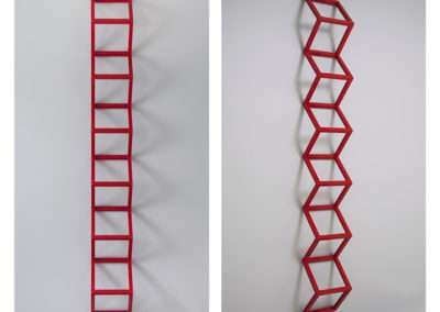 Two views of a red, ladder-like sculpture mounted on a white wall. the left image shows the sculpture straight, casting rectangular shadows. the right image shows the sculpture twisted, casting zigzag shadows.
