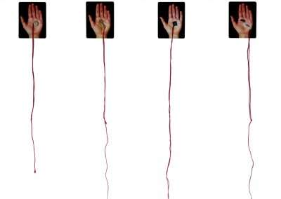 Four identical images arranged in a vertical column showing an open hand against a black background, each linked to red strings that extend downward out of frame, symbolizing connections to favorite things.
